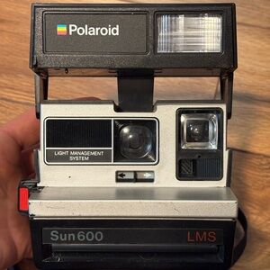 Polaroid Sun 600 LMS Camera - Black and Silver